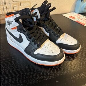 Nike Black and White Athletic Shoes with Orange Accents